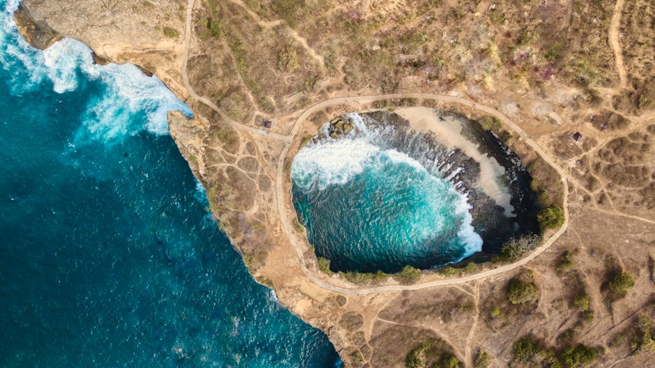 Stunning aerial view of Angel's Billabong in Nusapenida, Bali showcasing vibrant coastal beauty